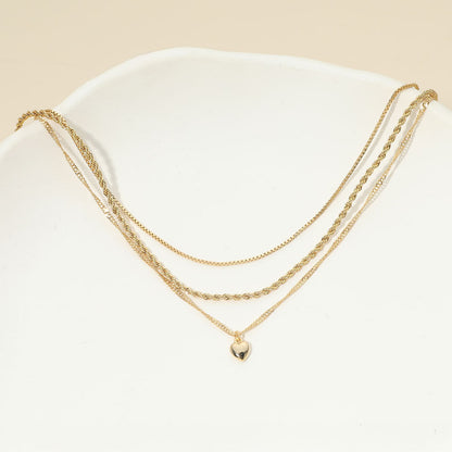 Madeline Love Gold 18K Gold Dipped Heart Charm Pendant Accent Mixed Chain Layered Necklace - Necklaces