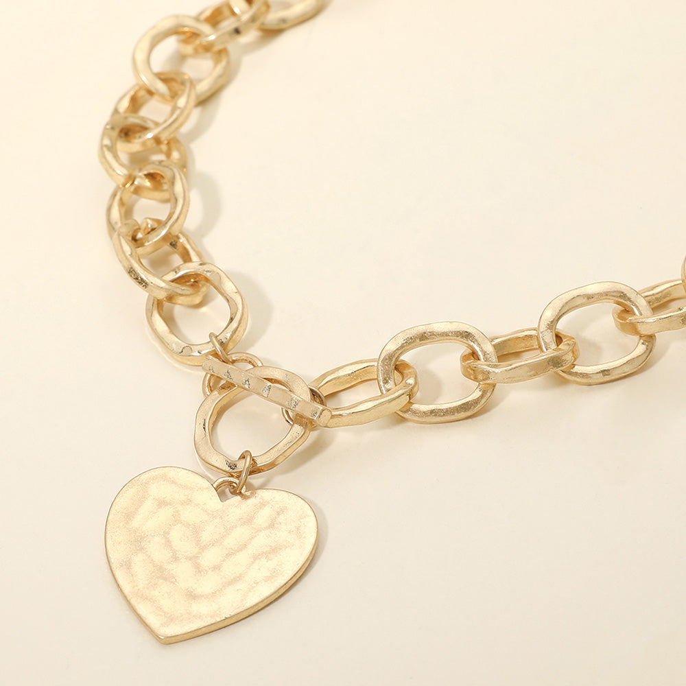 Madeline Love Worn Gold Hammered Metal Heart Charm Chunky Chain Toggle Necklace - Necklaces
