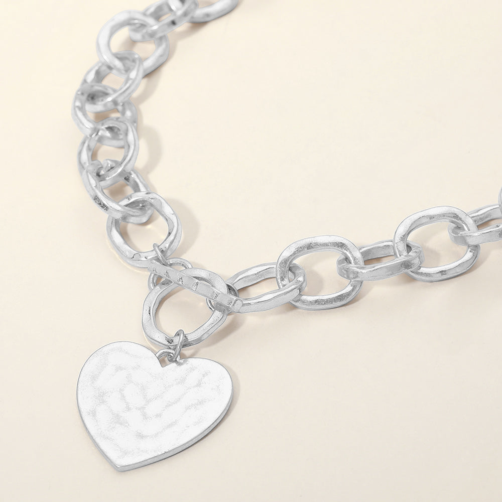 Madeline Love Worn Silver Hammered Metal Heart Charm Chunky Chain Toggle Necklace - Necklaces