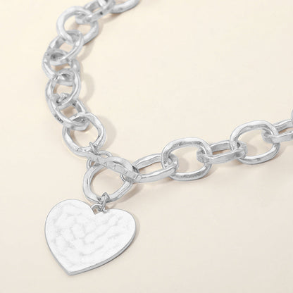 Madeline Love Worn Silver Hammered Metal Heart Charm Chunky Chain Toggle Necklace - Necklaces
