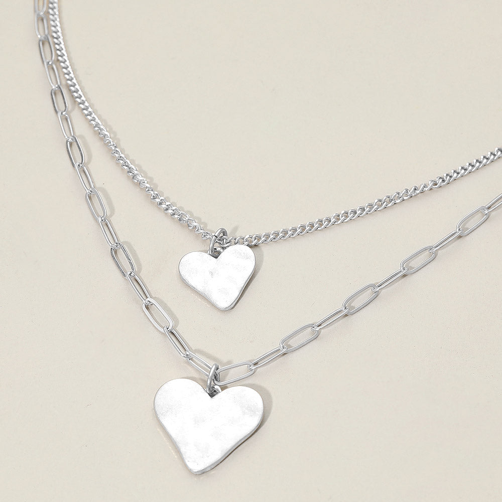 Madeline Love Worn Silver Hammered Metal Heart Pendant Accent Double Layered Necklace - Necklaces