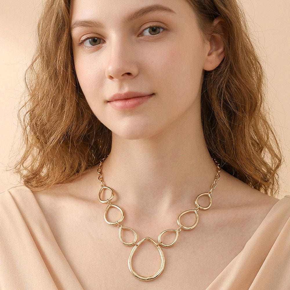 Madeline Love Gold Geometric Open Metal Teardrop Link Statement Necklace