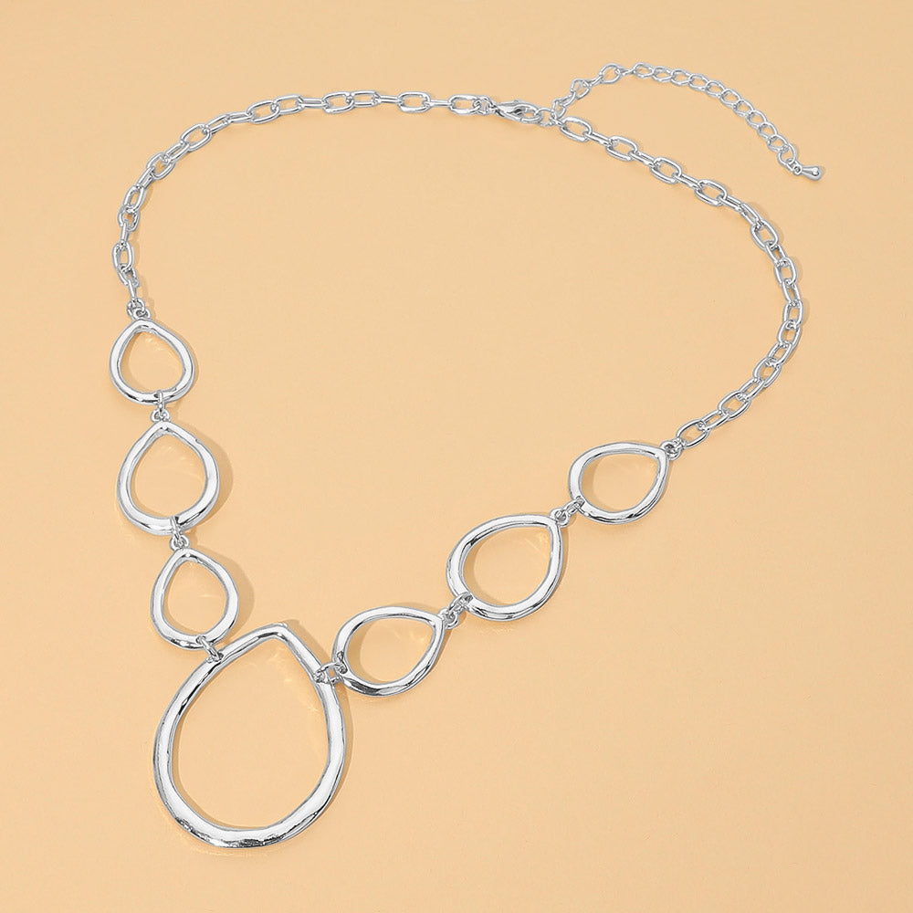 Madeline Love Rhodium Geometric Open Metal Teardrop Link Statement Necklace