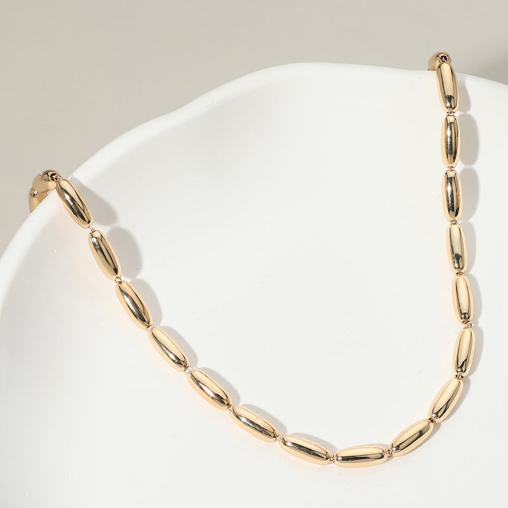 Madeline Love Gold Metal Oval Tube Beaded Necklace