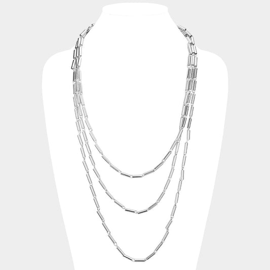 Madeline Love Rhodium Metal Cylinder Triple Layered Bib Necklace - Necklaces