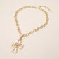 Madeline Love Worn Gold Hammered Metal Cross Toggle Pendant Necklace - Necklaces - desc
