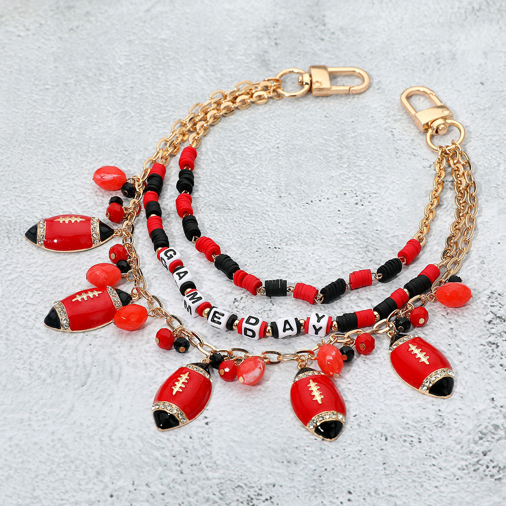 Madeline Love Black, Gold, Red Football Charm Embellished GAME DAY Heishi Beaded Layered Bag Charm - Bags & Wallets