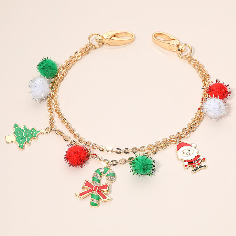 Madeline Love Gold Christmas Tree Santa Festive Pom Pom Bag Charm - Bags & Wallets