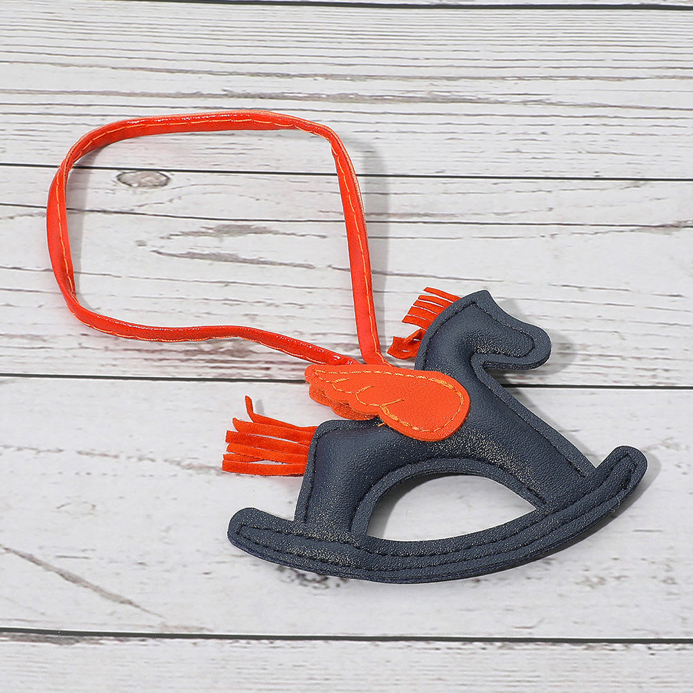 Madeline Love Blue Faux Leather Winged Rocking Horse Bag Charm - Bags & Wallets