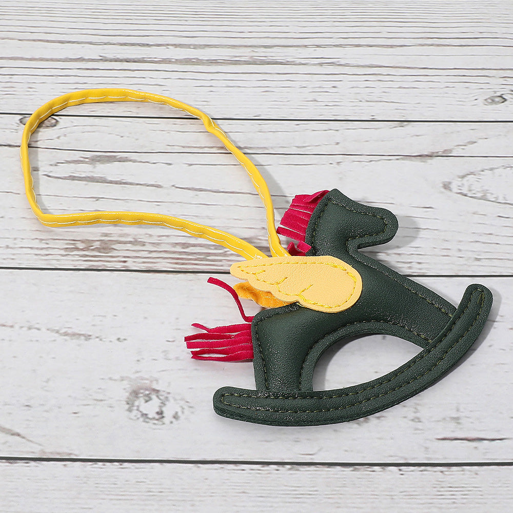Madeline Love Green Faux Leather Winged Rocking Horse Bag Charm - Bags & Wallets