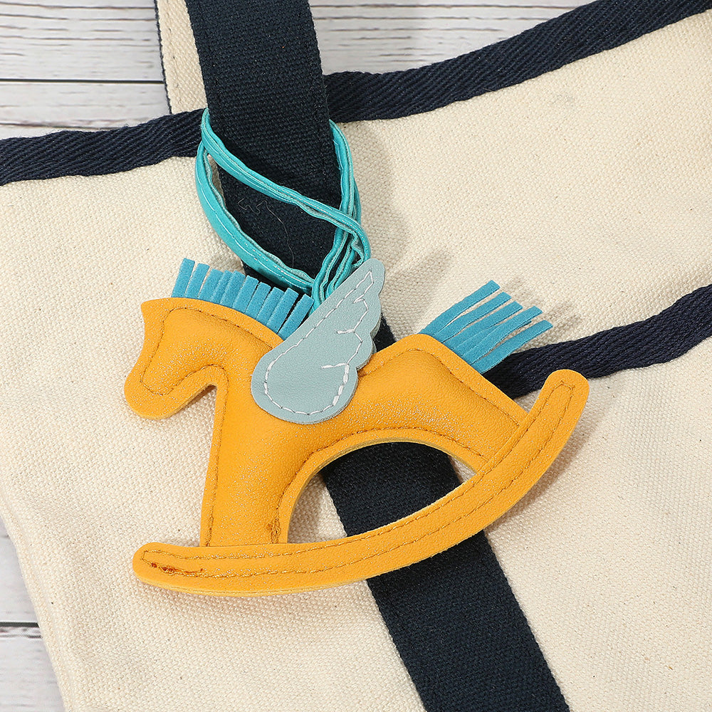 Madeline Love Yellow Faux Leather Winged Rocking Horse Bag Charm - Bags & Wallets