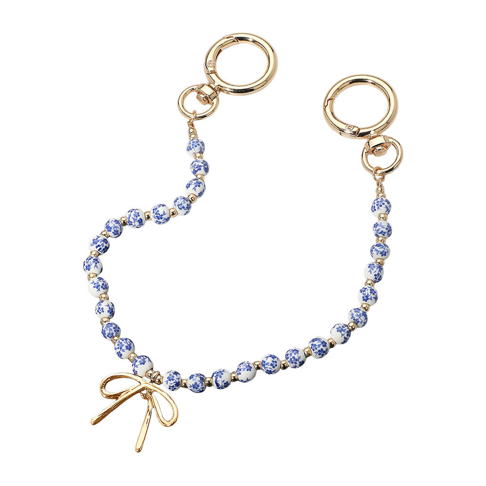 Madeline Love Blue, Gold Metal Bow Charm Pointed Floral Ceramic Ball Beaded Bag Charm - Bags & Wallets - extra