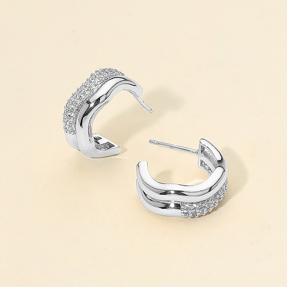 Madeline Love Silver 14K Gold Dipped CZ Stone Paved Wavy Mini Huggie Hoop Earrings