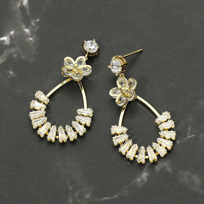 Madeline Love Gold Gold Dipped CZ Flower Accent Baguette Stone Cluster Embellished Teardrop Drop Earrings