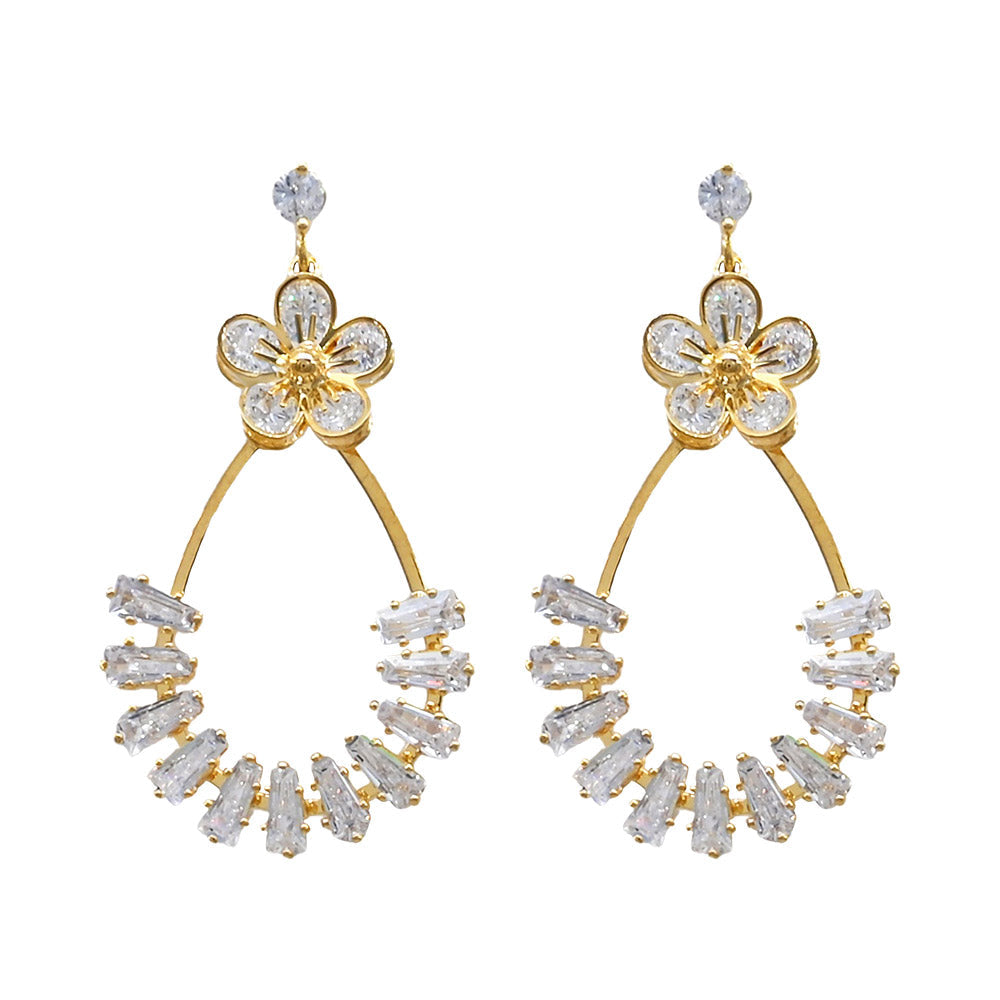 Madeline Love Gold Gold Dipped CZ Flower Accent Baguette Stone Cluster Embellished Teardrop Drop Earrings - desc