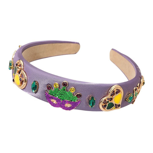 Gold Add festive flair to your celebration look with this embellished headband featuring sparkling gems, themed icons, and a striking mask motif. Designed for comfort and eye-catching style, it enhances parade outfits, party ensembles, and any spirited event attire.