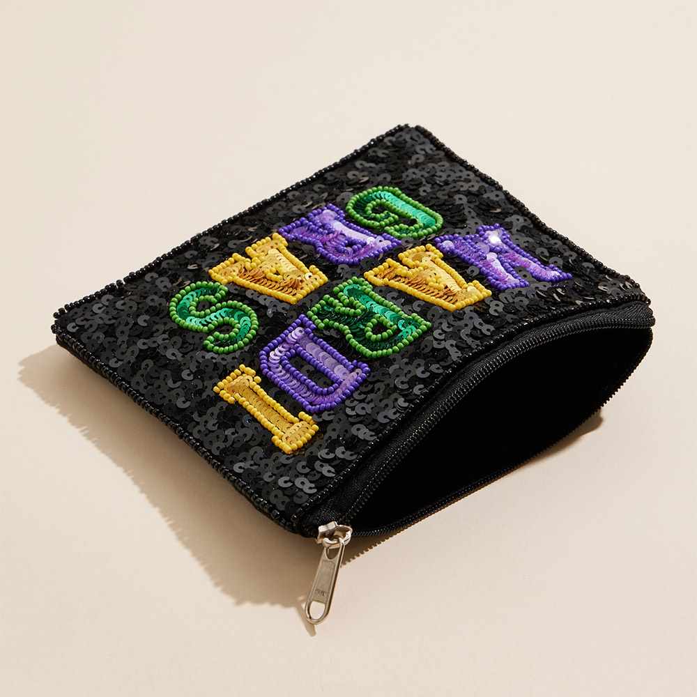 Mardi Gras Message Sequin Seed Beaded Mini Pouch Bag is the perfect accessory for any festive event. Adorned with vibrant sequins and beads, it adds sparkle and fun to any outfit. The mini pouch design makes it convenient for carrying essentials on the go. Celebrate in style with this must-have bag. 