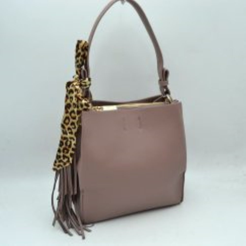 Mauve This structured shoulder bag features a clean, classic silhouette with a finely textured dark brown exterior, making it a stylish choice for everyday versatility. The design is detailed with an integrated top shoulder strap secured by polished gold-tone side rings. It stands out with a decorative, silky leopard-print scarf tied around one of the strap loops, complemented by a cascading long fringe tassel on the side for added movement and texture.