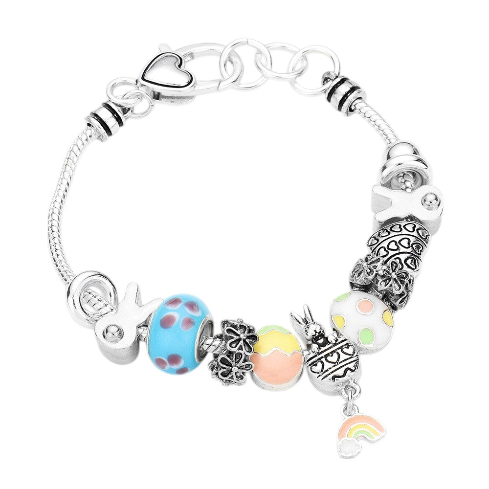 Antique Silver Metal Easter Bunny Enamel Egg Rainbow Bead Charm Bracelet features charming Easter bunny and enamel egg charms, complemented by a colorful rainbow of beads. This fun and festive bracelet adds a cheerful touch to your spring wardrobe, making it perfect for Easter celebrations or as a thoughtful holiday gift. 