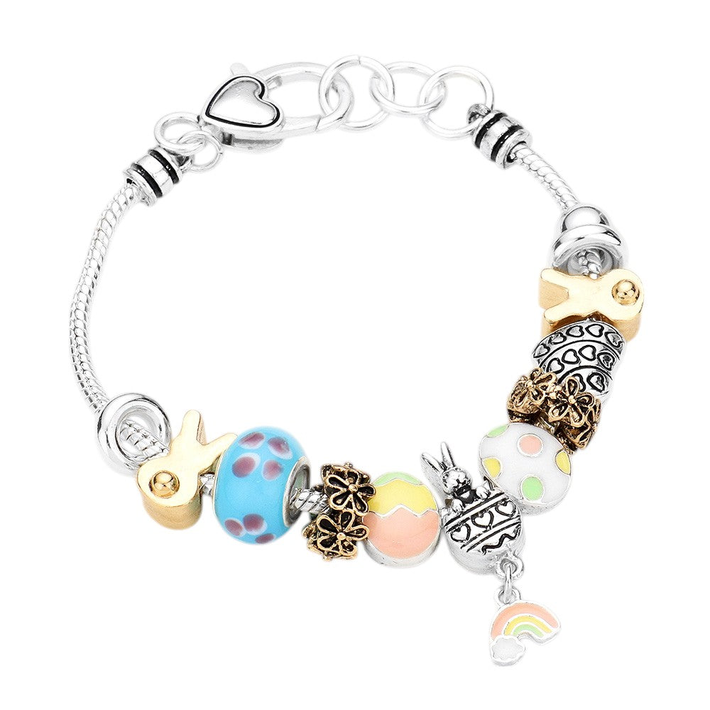  Two Tone Metal Easter Bunny Enamel Egg Rainbow Bead Charm Bracelet features charming Easter bunny and enamel egg charms, complemented by a colorful rainbow of beads. This fun and festive bracelet adds a cheerful touch to your spring wardrobe, making it perfect for Easter celebrations or as a thoughtful holiday gift. 