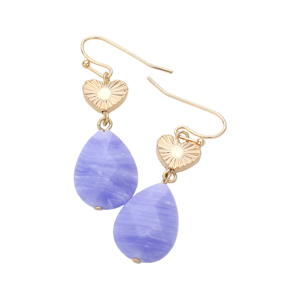 Blue Metal Heart Teardrop Natural Stone Link Dangle Earrings feature a unique design that combines metal and natural stone elements. The teardrop shape adds a touch of elegance while the natural stone offers a hint of nature. Perfect for adding a touch of style to any outfit. 