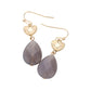 Metal Heart Teardrop Natural Stone Link Dangle Earrings feature a unique design that combines metal and natural stone elements. The teardrop shape adds a touch of elegance while the natural stone offers a hint of nature. Perfect for adding a touch of style to any outfit. 