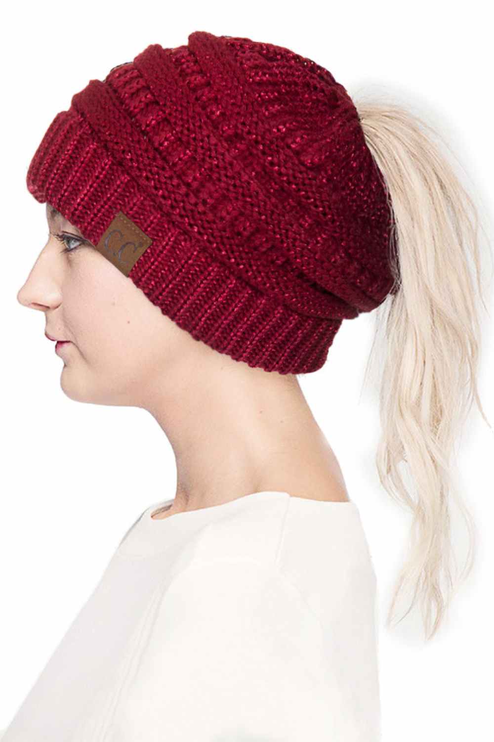 Burgundy Stay cozy and stylish with the C.C Metallic Messy Bun Ponytail Beanie, designed for effortless everyday wear. Crafted from 100% acrylic, this lightweight beanie features a sleek metallic finish that adds a modern touch to any outfit.