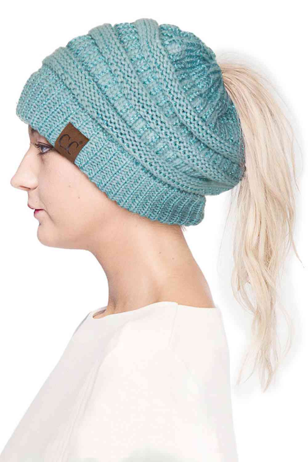 Mint Stay cozy and stylish with the C.C Metallic Messy Bun Ponytail Beanie, designed for effortless everyday wear. Crafted from 100% acrylic, this lightweight beanie features a sleek metallic finish that adds a modern touch to any outfit.