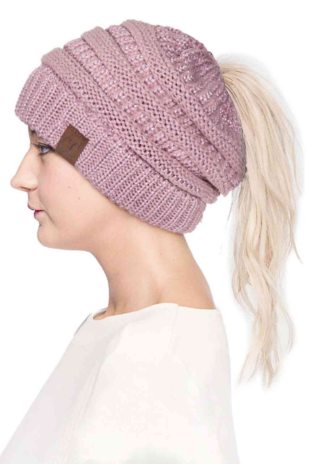 Rose Stay cozy and stylish with the C.C Metallic Messy Bun Ponytail Beanie, designed for effortless everyday wear. Crafted from 100% acrylic, this lightweight beanie features a sleek metallic finish that adds a modern touch to any outfit.