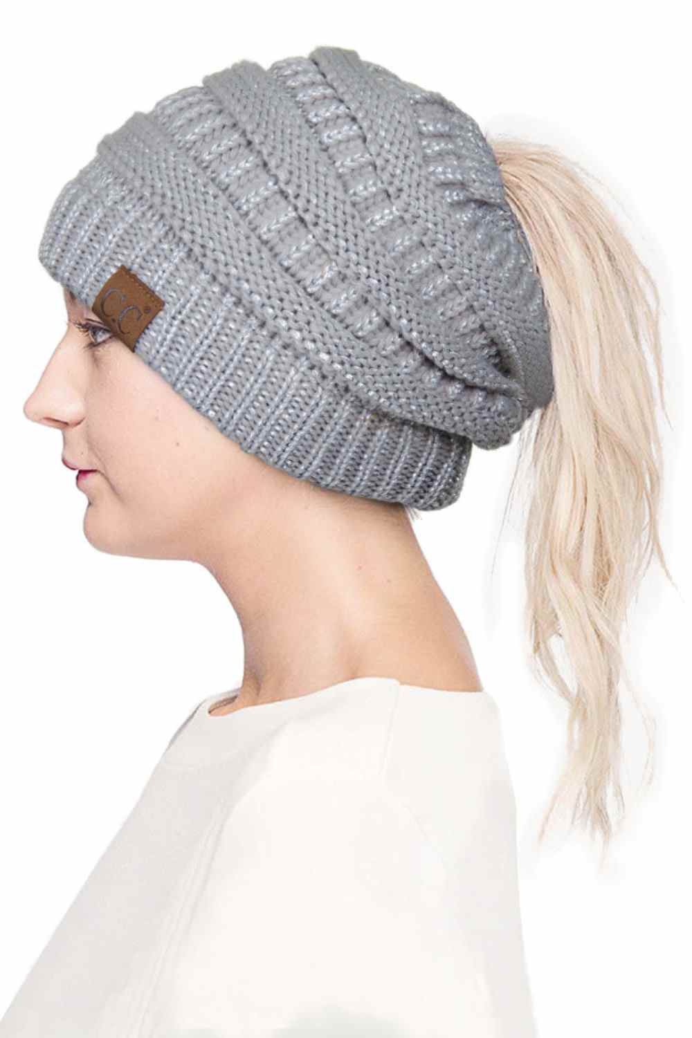 Silver Stay cozy and stylish with the C.C Metallic Messy Bun Ponytail Beanie, designed for effortless everyday wear. Crafted from 100% acrylic, this lightweight beanie features a sleek metallic finish that adds a modern touch to any outfit.