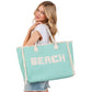 Mint BEACH Message Embroidered Fringe Tote Bag / Beach Bag is perfect for any beach day. With its spacious interior and stylish embroidered fringe detailing, it's both functional and fashionable. Carry all your beach essentials in one convenient and trendy tote. 