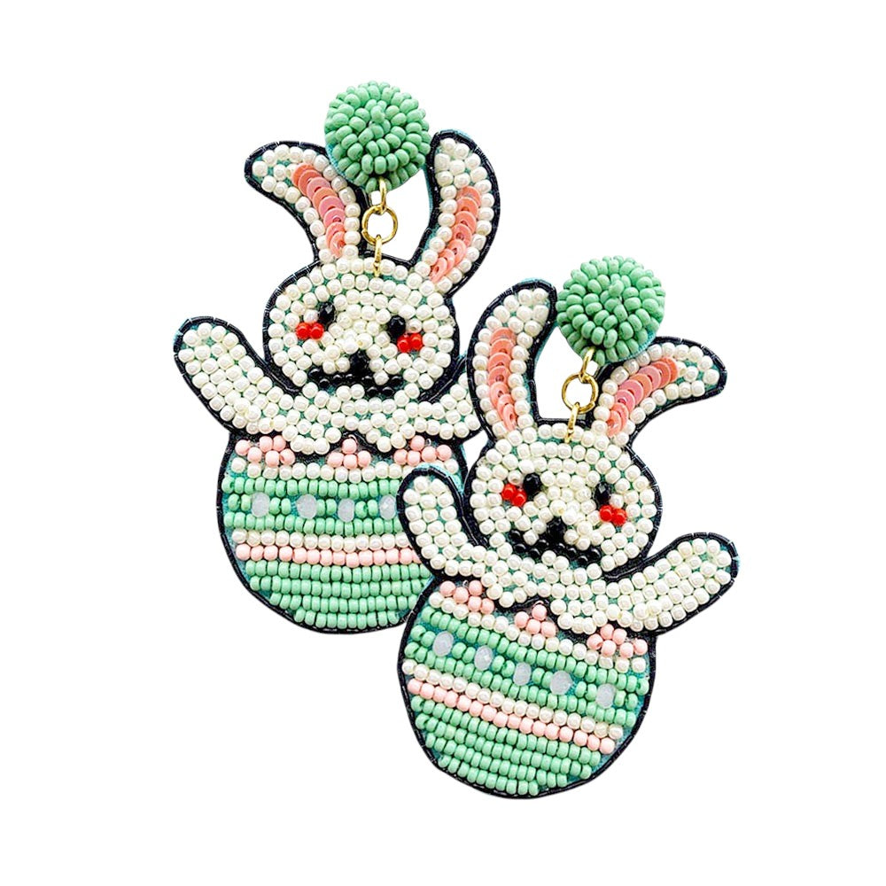 Mint Felt Back Seed Beaded Easter Bunny Egg Dangle Earrings are a charming addition to any Easter outfit. Featuring delicate seed beads and a cute bunny and egg design, they are the perfect accessory for a festive look. The felt backing adds a touch of comfort, making them ideal for all-day wear.