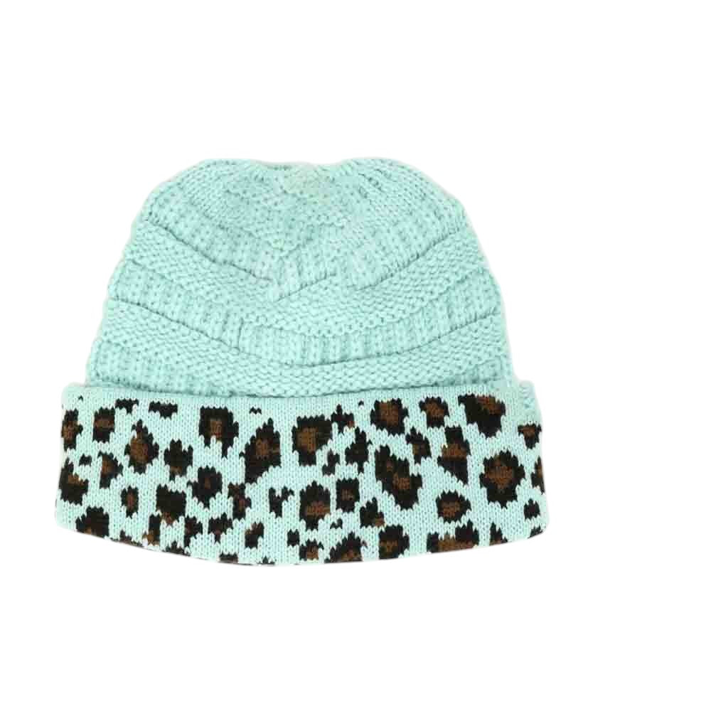 Mint Matching Cuff Leopard Print CC Beanie Tail combines bold leopard patterning with a cozy cuff for an effortlessly stylish accessory. Designed with an extended tail shape, this beanie provides a comfortable fit while adding a fashionable edge to your cold-weather wardrobe. Its soft, durable fabric ensures warmth and long-lasting wear, making it a practical choice for everyday use with a distinctive flair. 
