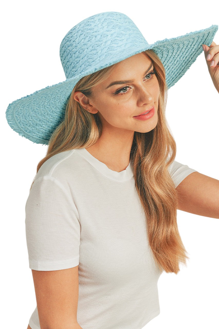 Mint Solid Floppy Sun Hat provides superior UV protection while maintaining a timeless silhouette. Constructed with durable materials that retain shape throughout wear, it features an adjustable interior band for a secure fit across head sizes. The lightweight design ensures comfort during extended outdoor activities, making it an essential accessory for both sun protection and refined style.