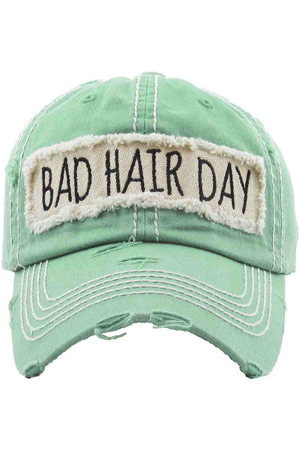 Mint Keep it casual and playful with the BAD HAIR DAY Washed Vintage Baseball Cap, featuring a relaxed, worn-in style that adds personality to any outfit. Designed with a classic curved brim and comfortable fit, it’s the perfect go-to accessory for effortless everyday wear.