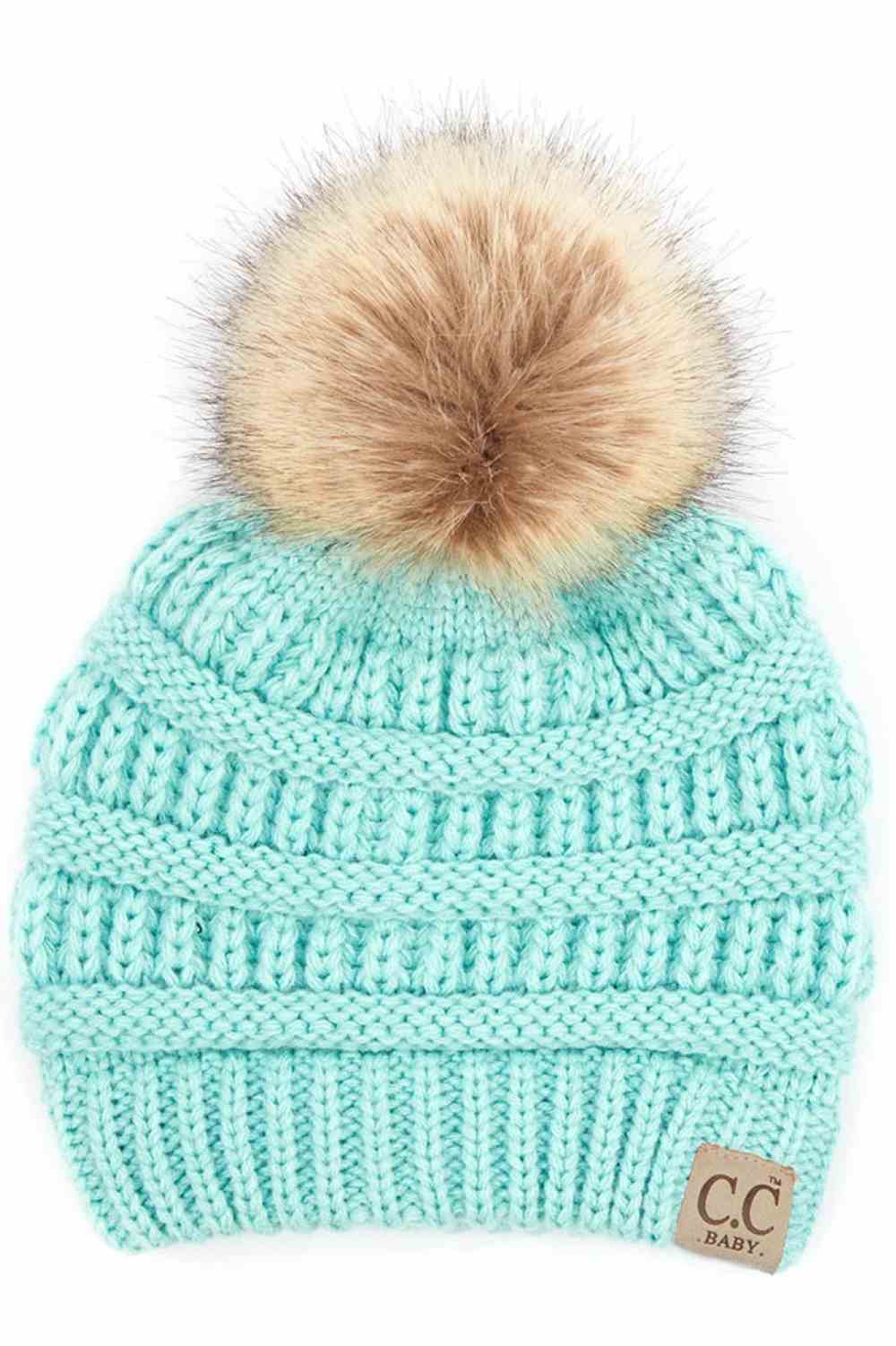 Mint Keep your little one warm and cozy with this C.C Solid Ribbed Infant Beanie. Made from 100% acrylic, the soft ribbed knit construction provides gentle comfort against delicate skin while the natural fur pom adds a charming detail.