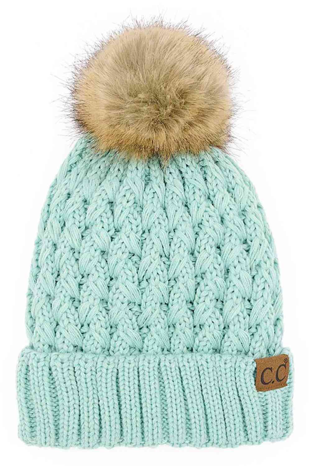 Mint Elevate your winter wardrobe with the C.C Lattice Crossover Stitch Beanie, featuring an intricate lattice pattern and cozy pom detail. Crafted from 100% soft acrylic, this beanie delivers warmth and comfort without the weight. The crossover stitch design adds visual interest while the relaxed fit suits most face shapes. Perfect for layering over your favorite winter looks, this versatile beanie transitions effortlessly from casual outings to outdoor adventures. One size fits most for easy, everyday wea