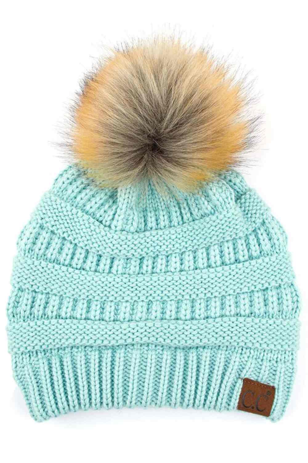 Mint Stay warm and cozy with this classic C.C Pom Pom Knit Beanie, crafted from 100% soft acrylic for all-day comfort. The ribbed knit design adds texture and durability, while the signature pom pom on top brings a playful touch to any winter outfit. One size fits most, making it the perfect accessory for everyone. Ideal for cold weather adventures or casual everyday wear.