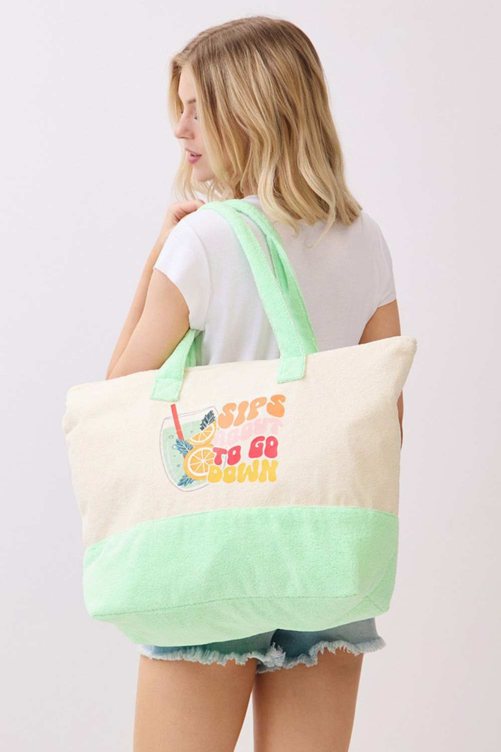 Mint Brighten your summer days with this vibrant terry tote bag featuring a cheerful "HELLO SUMMER" letter design and playful flamingo motif. Crafted from a durable polyester and polyamide blend, this spacious 22" x 16" x 6" bag is perfect for beach trips, shopping, or everyday adventures. The secure zipper closure keeps your essentials safe, while the convenient inner pocket adds extra organization. Whether you're heading to the shore or running errands around town, this fun and functional tote brings a sp