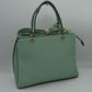 Mint green Textured Faux Leather Top Handle Tote Bag, is designed with state-of-the-art faux leather. It features a textured design and a comfortable top handle for easy carrying. Its spacious interior allows you to carry your everyday necessities in style. Perfect for any occasion or everyday use making it a great gift choice.