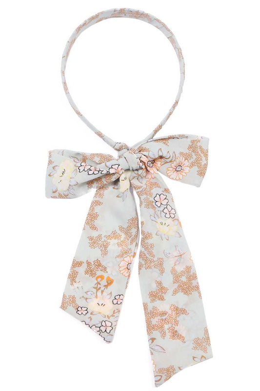 Mint Elevate your everyday look with this charming floral print headband featuring an integrated ponytail design. Crafted from 100% polyester, it offers a comfortable, lightweight fit that works for any occasion from casual outings to active days. The vibrant floral pattern adds a touch of feminine style while keeping your hair neatly secured. One size fits most, making it a versatile accessory for anyone seeking effortless elegance and practicality.