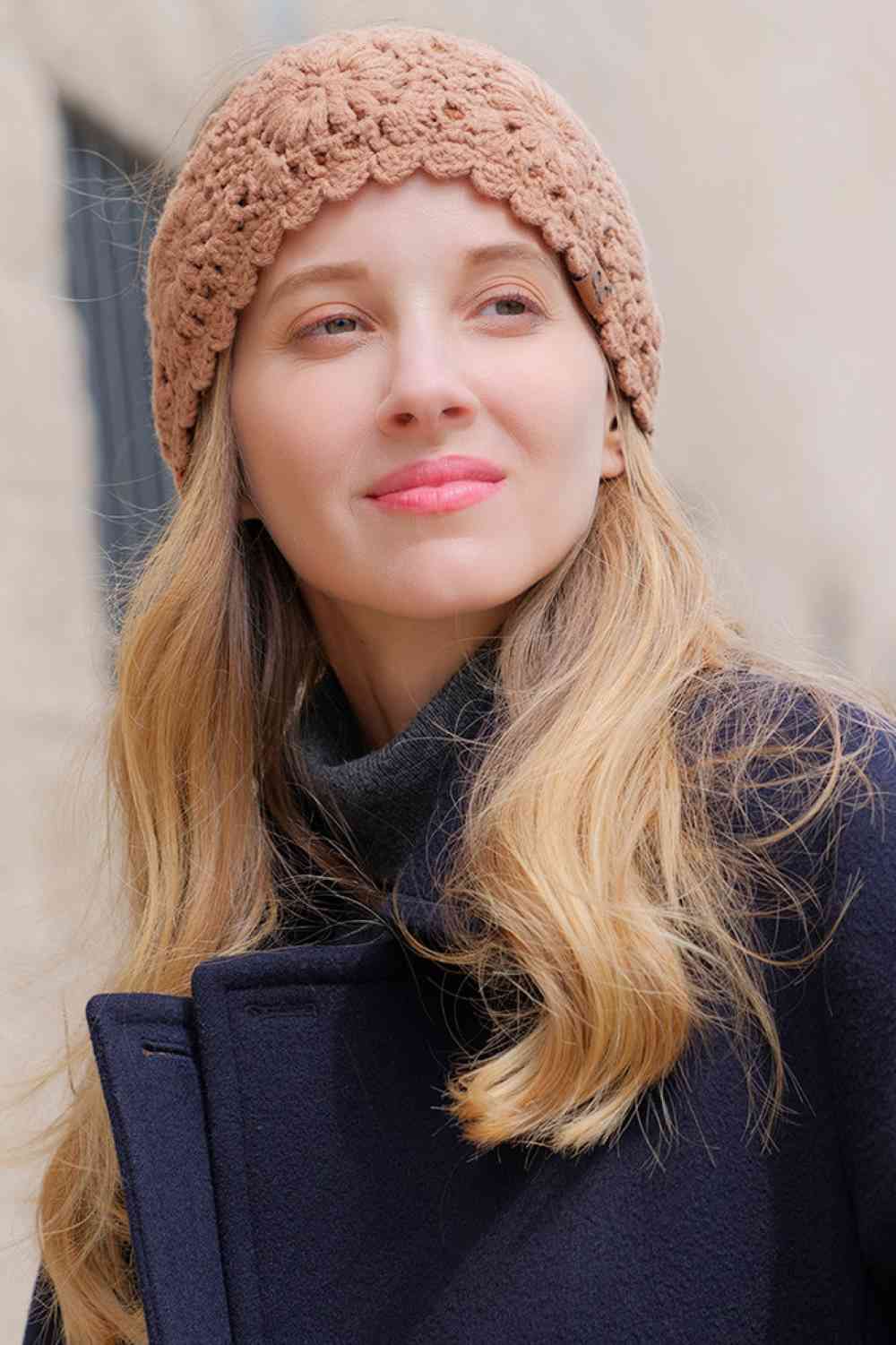 Model Wrap your head in cozy comfort with this charming C.C Flower Pattern Crocheted Headwrap. Featuring an intricate flower design crafted from soft 100% acrylic, this winter headband offers warmth without the bulk. The generous 10" x 4" dimensions provide a perfect fit for one size, making it an easy grab-and-go accessory for chilly days. Whether you're heading out for errands or settling in at home, this versatile headwrap adds a touch of style while keeping you snug and warm.