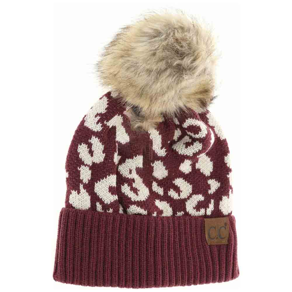 Monaco Leopard Pattern Fur Pom Beanie offers a sophisticated blend of fashion and function. Designed with a striking leopard print and topped with a plush fur pom, this beanie provides exceptional warmth without compromising style. Its high-quality construction ensures a comfortable fit that locks in heat, making it the perfect accessory to elevate your cold-weather wardrobe with expert flair. 
