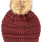 Monaco Stay warm and cozy with this classic C.C Pom Pom Knit Beanie, crafted from 100% soft acrylic for all-day comfort. The ribbed knit design adds texture and durability, while the signature pom pom on top brings a playful touch to any winter outfit. One size fits most, making it the perfect accessory for everyone. Ideal for cold weather adventures or casual everyday wear.