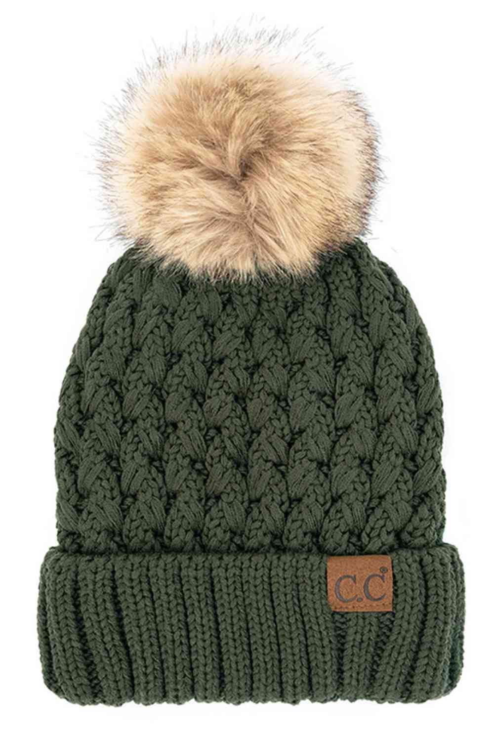 Moss Elevate your winter wardrobe with the C.C Lattice Crossover Stitch Beanie, featuring an intricate lattice pattern and cozy pom detail. Crafted from 100% soft acrylic, this beanie delivers warmth and comfort without the weight. The crossover stitch design adds visual interest while the relaxed fit suits most face shapes. Perfect for layering over your favorite winter looks, this versatile beanie transitions effortlessly from casual outings to outdoor adventures. One size fits most for easy, everyday wea