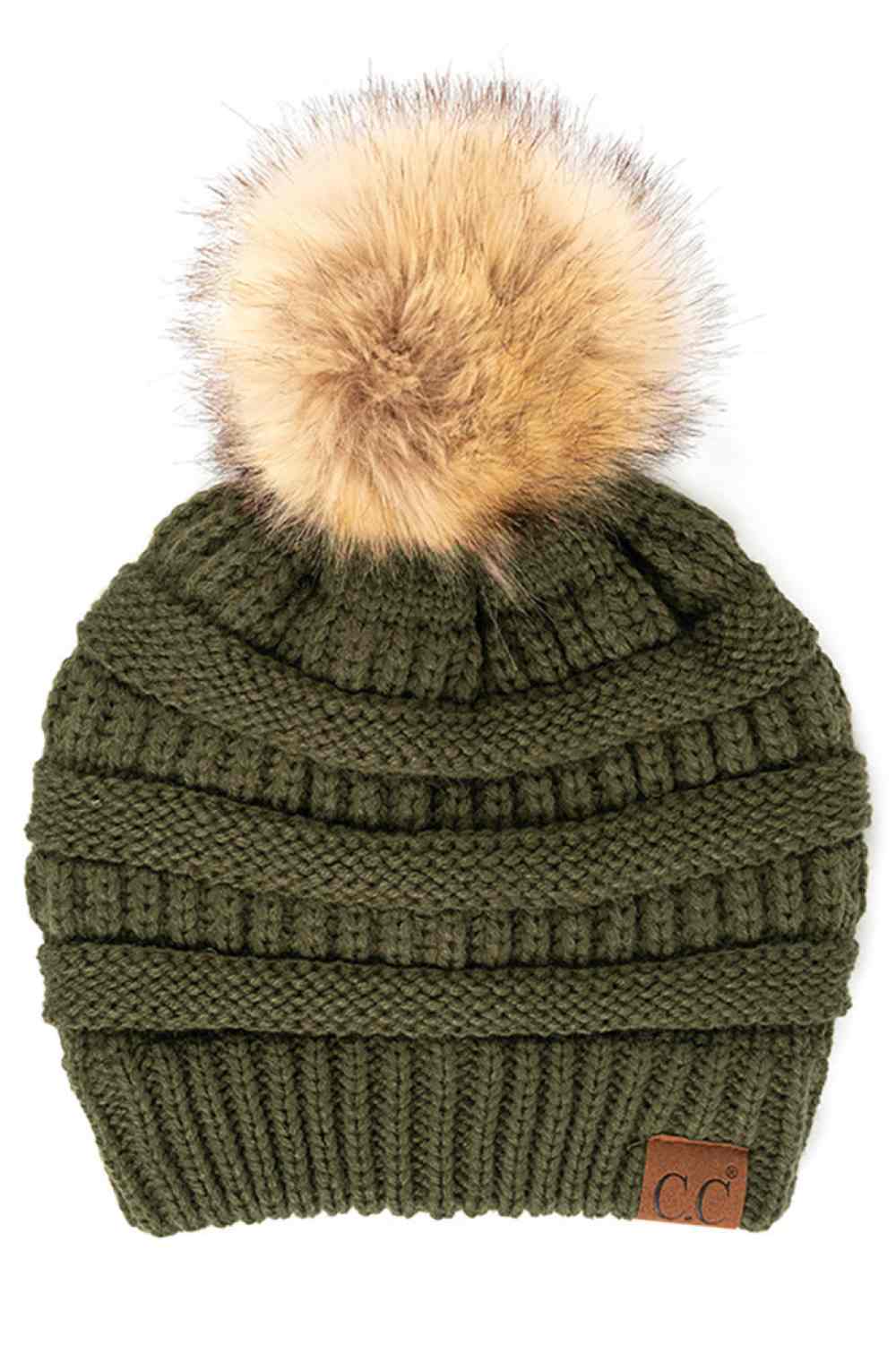 Moss Stay warm and cozy with this classic C.C Pom Pom Knit Beanie, crafted from 100% soft acrylic for all-day comfort. The ribbed knit design adds texture and durability, while the signature pom pom on top brings a playful touch to any winter outfit. One size fits most, making it the perfect accessory for everyone. Ideal for cold weather adventures or casual everyday wear.