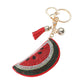 Multi Bling Studded Watermelon Tassel Keychain adds a touch of fun and flair to your keys. The sparkling studs and vibrant tassel make it easy to spot in your bag, while the durable construction ensures your keys stay safe and secure. Perfect for adding style to any keychain collection.