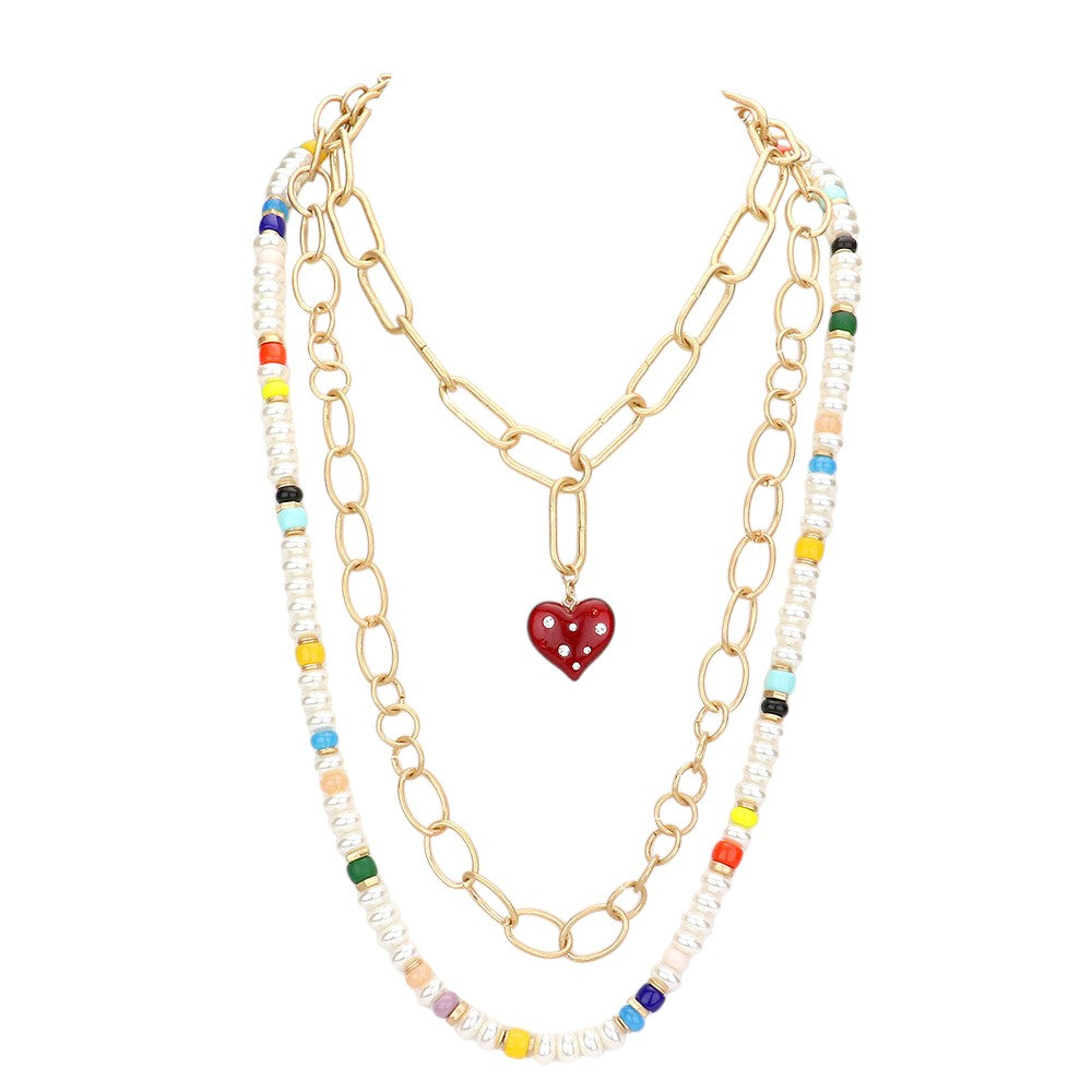 Multi Heart Pendant Accented Pearl Resin Beaded Triple Layered Necklace adds a touch of elegance and sophistication to any outfit. The heart pendant adds a sentimental touch, while the layered design creates a bold and eye-catching look. Made with high-quality materials, this necklace is both beautiful and durable.