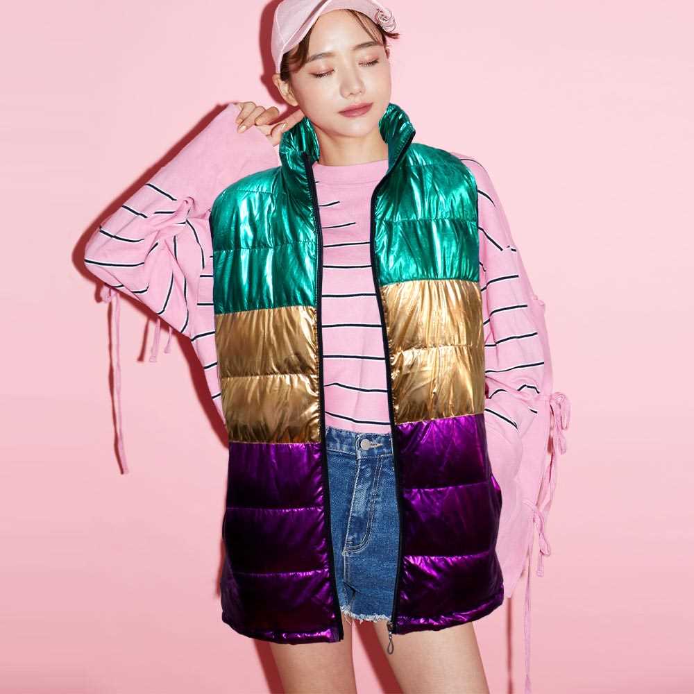 Multi-Mardi Gras Color Block Puffer Vest is the perfect addition to your wardrobe. With its vibrant colors and stylish design, it will keep you warm and comfortable while making a statement at any event. Made with high-quality materials, it's both durable and fashionable. Elevate your style with this must-have vest. 