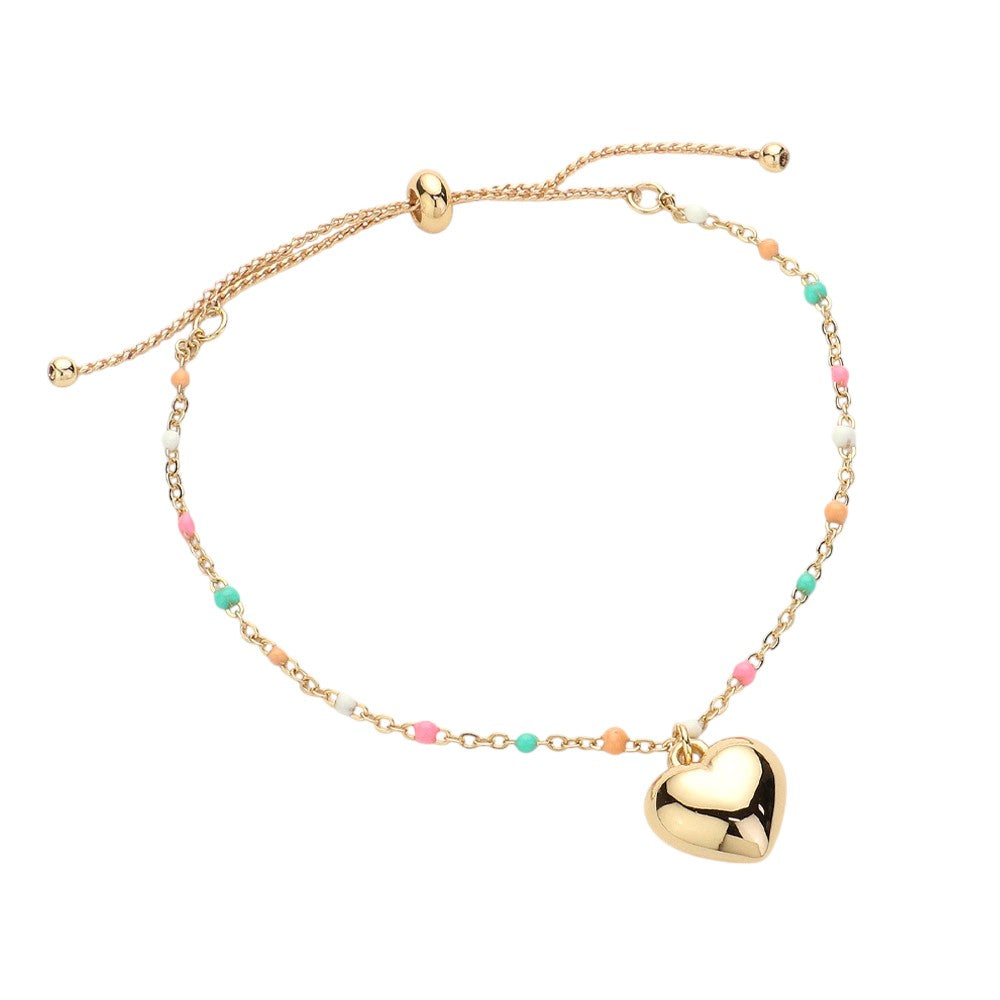 Multi Metal Heart Charm Beads Station Pull Tie Cinch Bracelet is a stylish and versatile accessory to add to your jewelry collection. The metal heart charm beads add a touch of elegance, while the pull tie cinch design allows for an adjustable and comfortable fit. Perfect for any occasion, this bracelet is a must-have for any fashion-forward individual